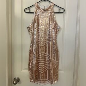 Medium rose gold bodycon/bandage dress.